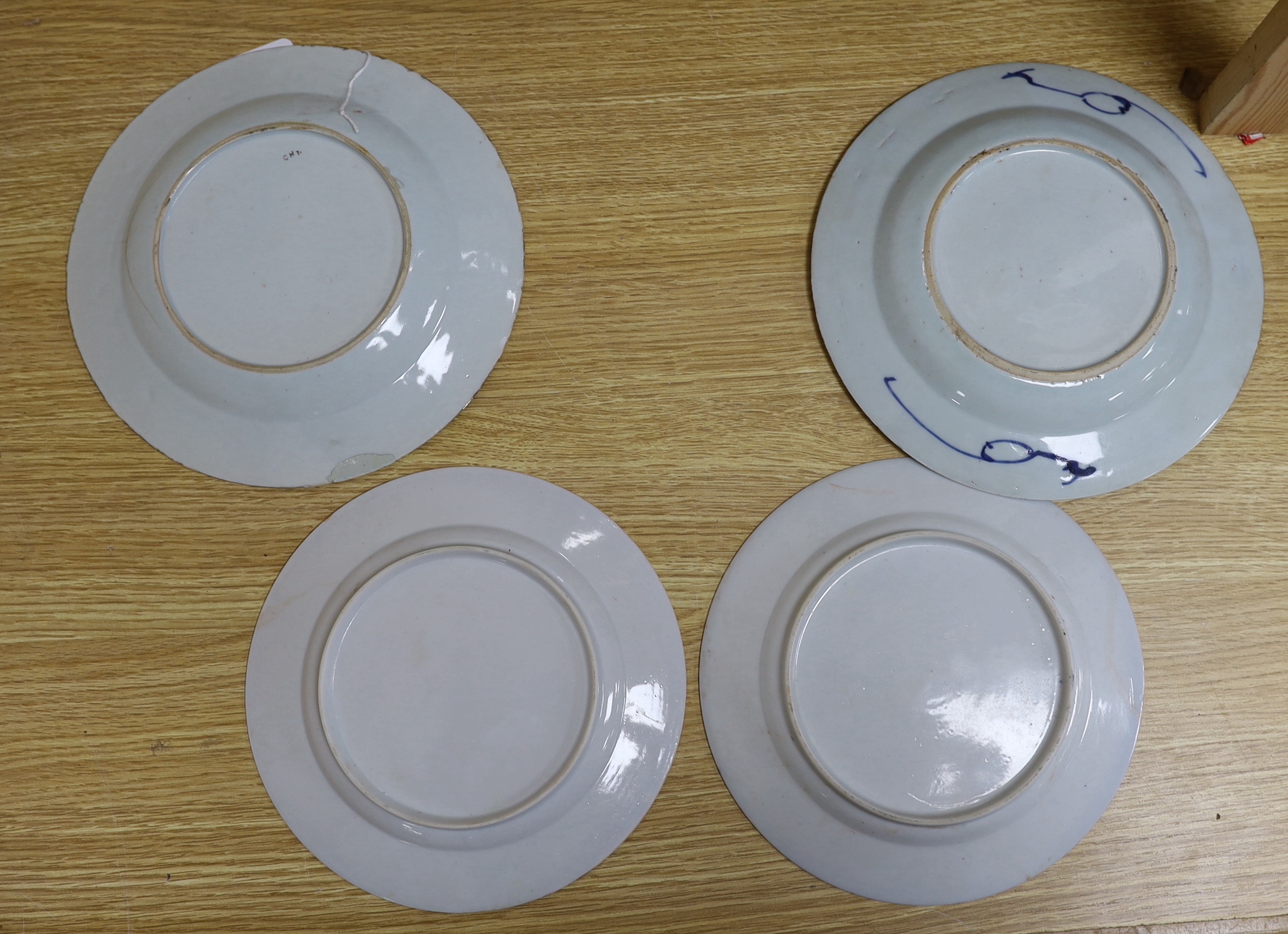 Two Chinese Armorial plates and two Chinese export plates, armorial plates 21cm diameter